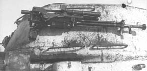 MG in transport position on the turret